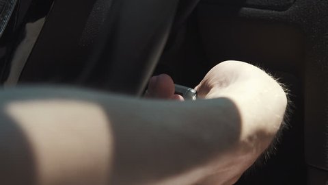 Car Keys Being Put into Ignition