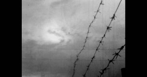 Novoyeniseysk, Russia - march 1970s: barbed wire, sky. Military building, block post. Archive of the Army of the USSR.