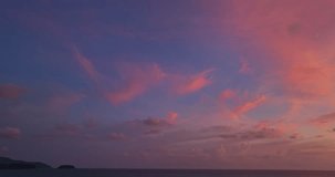 aerial view amazing sky in sweet sunset above Karon beach Phuket.
Nature video High quality footage. colorful cloud scape sky texture.
Real amazing panoramic sunset sky with gentle colorful clouds.