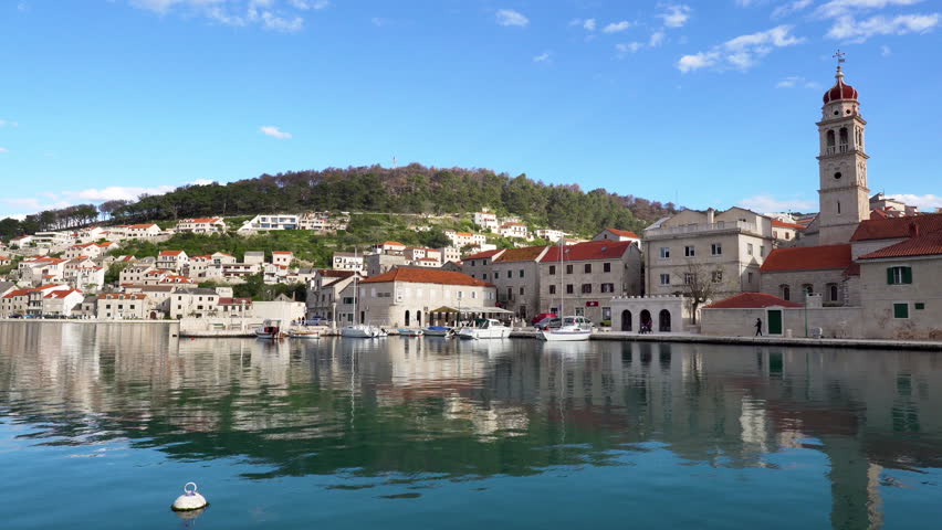 Panorama of Pucisca small city on Island Brac - Croatia. Shoot from the shore.