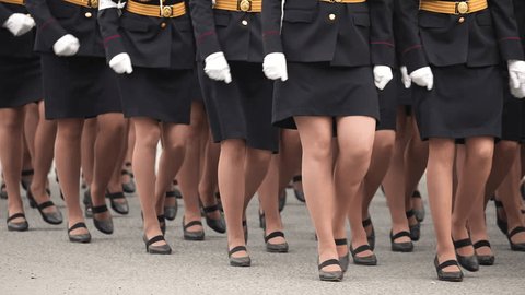 Female military army. Woman rights concept. Lot feminist girls walk. 9 may victory parade. War soldiers row close up. Feminism troop march. Many legs step slow motion. Job uniform. Anti sexism fight. ஸ்டாக் வீடியோ
