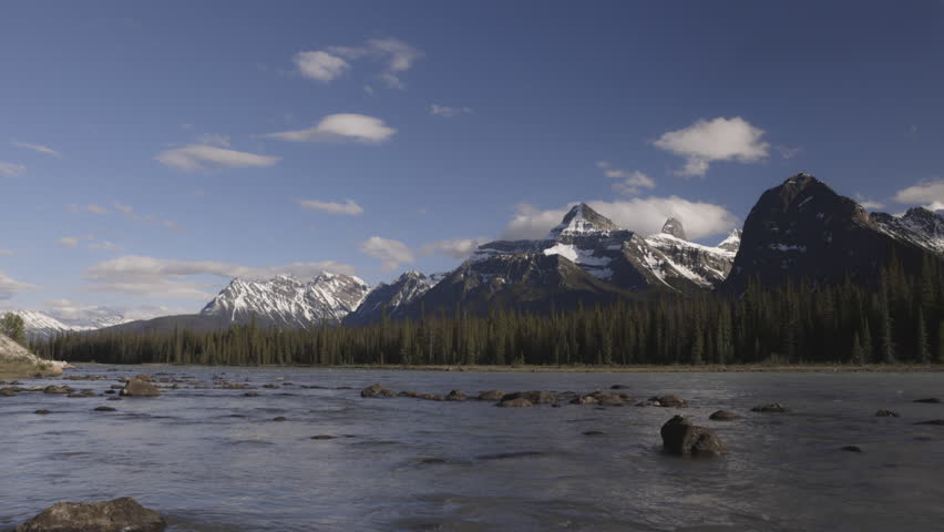 The river gently flows in Jasper National Park in Alberta Canada