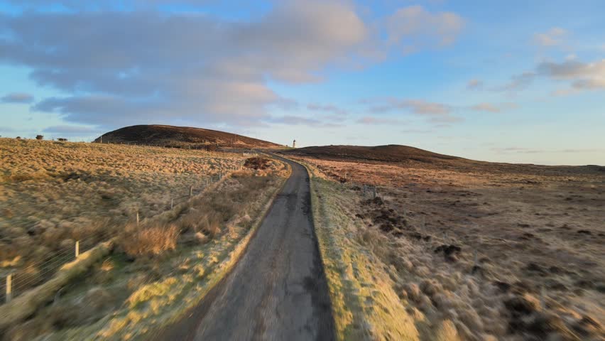 Road to Tiumpan Head Lighthouse at Sunrise isle of Lewis, Scotland Aerial View