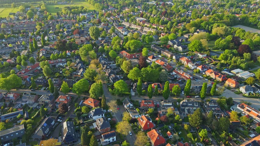 Beautiful aerial of a middle class suburban neighborhood in summer Royalty-Free Stock Footage #1104411857
