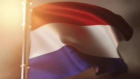Dutch flag flying in the wind at sunrise, slow motion - Powered by Shutterstock - Get 15% off with code: PIKWIZARD15