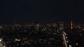 TOKYO, JAPAN : Aerial high angle sunrise CITYSCAPE of TOKYO. View of buildings around Roppongi from Shibuya. Time lapses shot, night to morning. Japanese city life and metropolis concept 4K video.