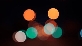 Blurred lights evening city traffic bokeh. Defocused night city traffic. Blurred lights bokeh car headlights driving evening city road. City night traffic background - Powered by Shutterstock - Get 15% off with code: PIKWIZARD15