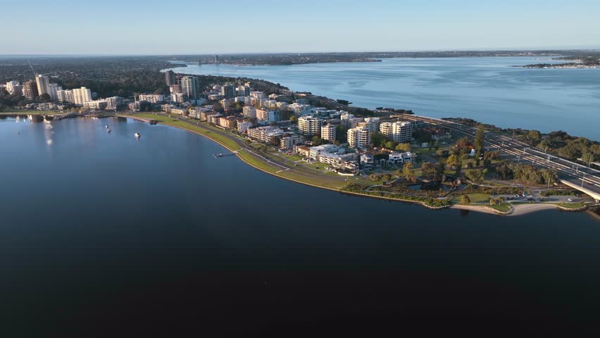 Aerial view of Perth residential district along Swan River at sunset, Western Australia, Australia.