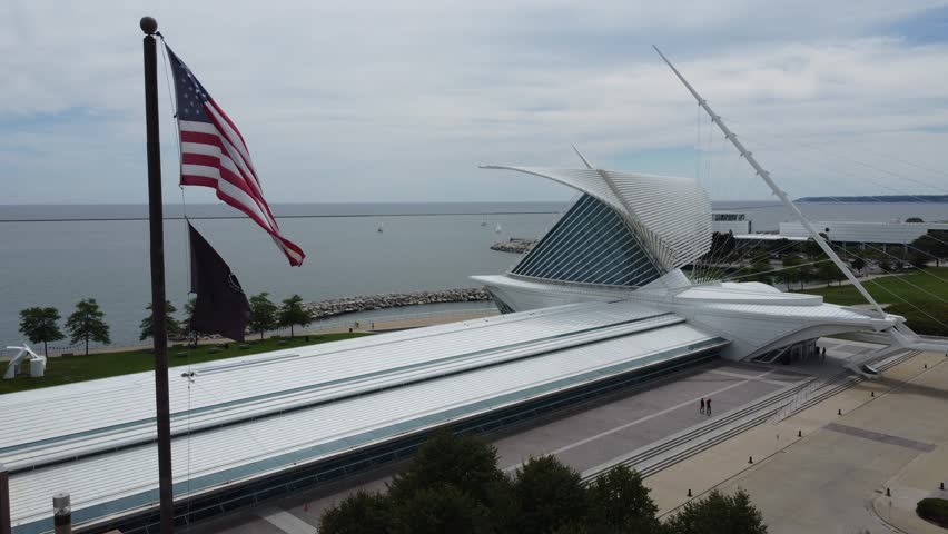 A captivating drone view of Milwaukee, USA, showcasing its skyline, iconic landmarks, and the scenic waterfront along Lake Michigan, highlighting the city
