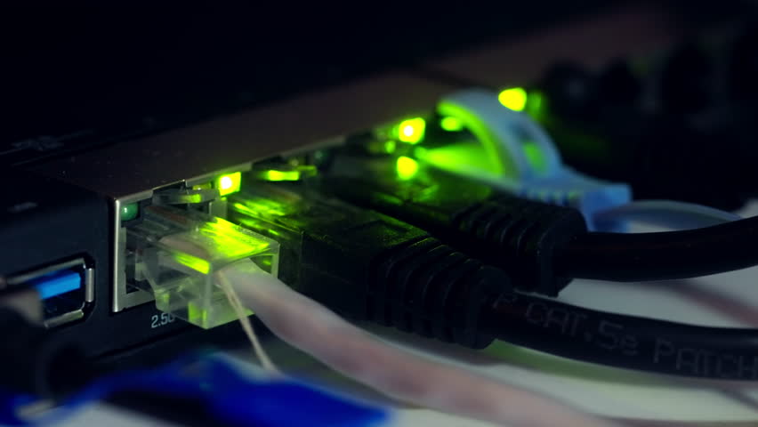 Ethernet cables plugged into router, blinking green light, Internet connection. High-speed Internet connection Royalty-Free Stock Footage #1104434495