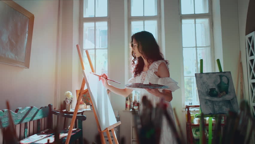 woman artist paint with brushes and oil dye Royalty-Free Stock Footage #1104436505