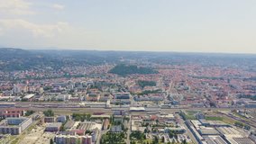 Inscription on video. Graz, Austria. The historic city center aerial view. Mount Schlossberg (Castle Hill). Glitch effect text, Aerial View