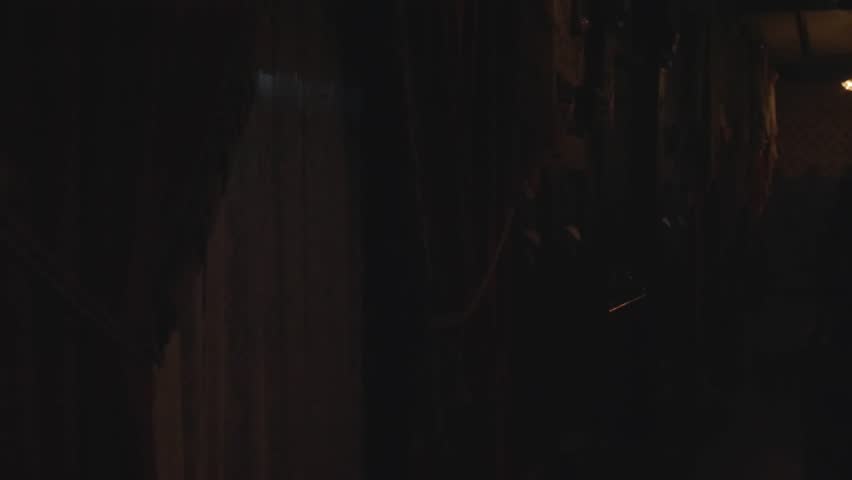 This video shows ominous lightning flashing through old victorian mansion curtains. Royalty-Free Stock Footage #1104440451