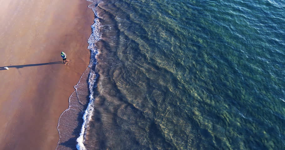 Top view Sea video foamy come in sand At Phuket Thailand in summer sunset Nature and travel concept Footage high quality ProRes422  | Shutterstock HD Video #1104444017
