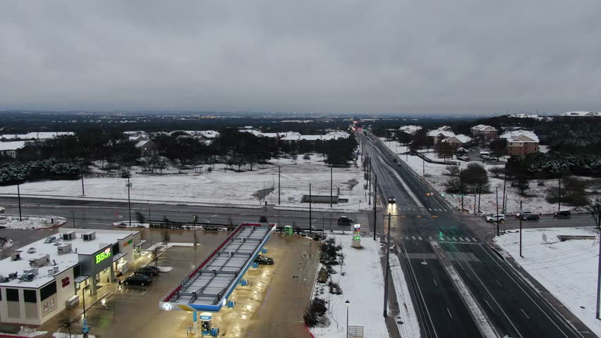 Aerial views from over Austin Texas during a rare Snow Storm