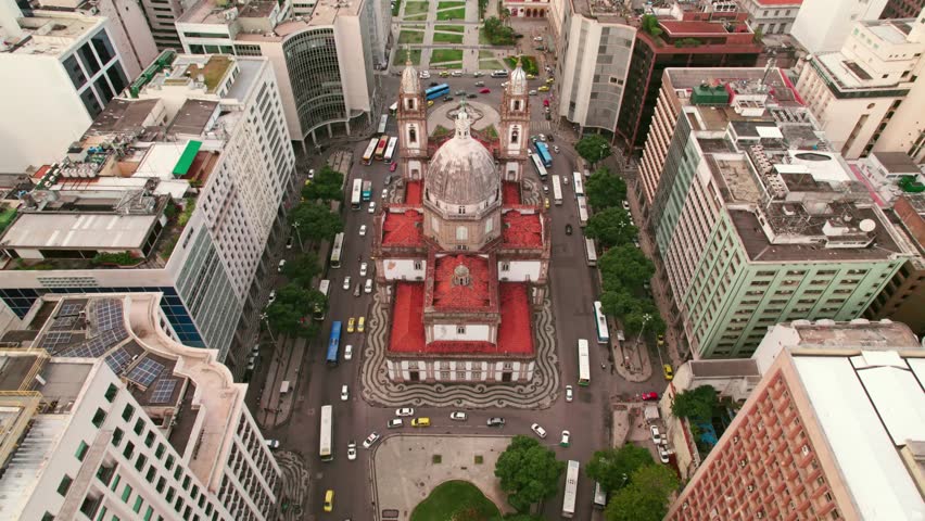 Aerial view dolly in of the Candelaria Church with tiled roof, made entirely of limestone from Lisbon. Historical center of Rio de Janeiro