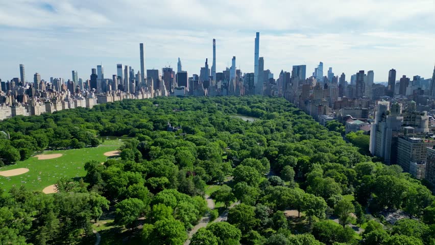 Flying above central park in New York city  Royalty-Free Stock Footage #1104465343