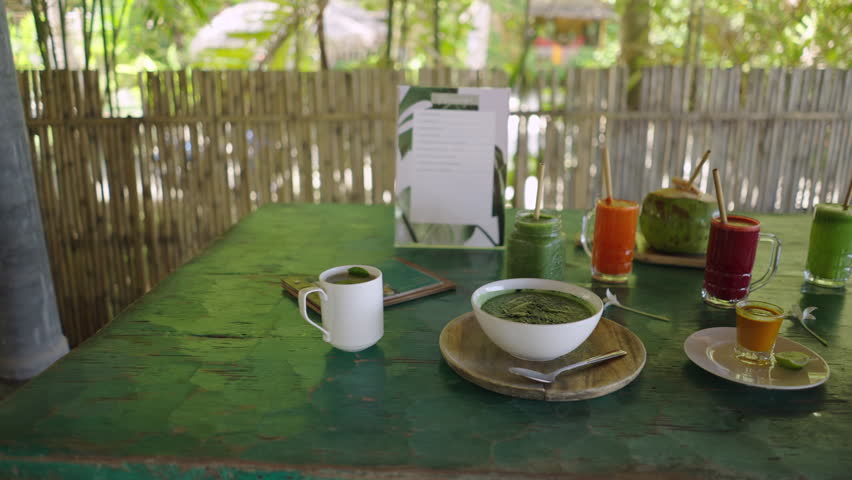 Marketing products of Orion Healing Center in Thailand displayed over wooden surface 