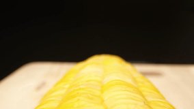 Mesmerizing macro video of sweet corn captured with a probe lens. Revealing vibrant colors, plump kernels it showcases the captivating beauty of corn up close and in stunning detail. Macro dolly shot
