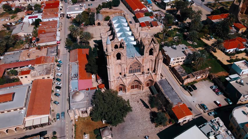 Lala Mustafa Pasha Mosque or Cathedral of Saint Nicholas in Famagusta, North Cyprus on sunny day with clear sky