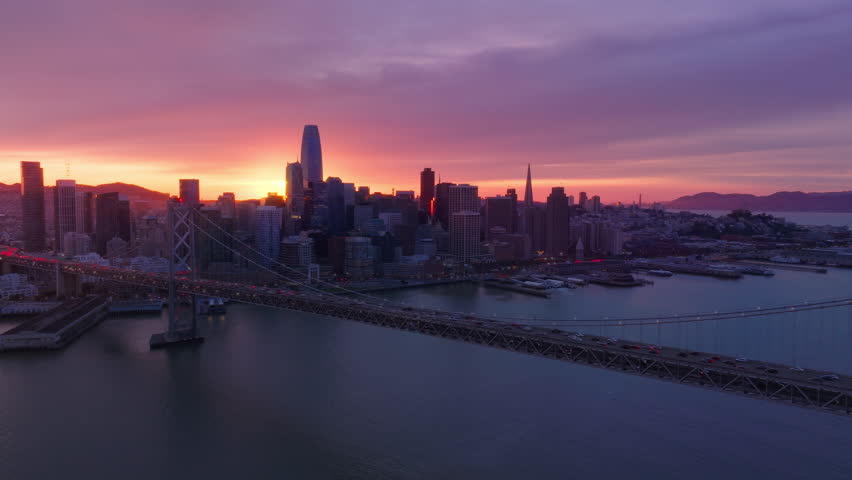 Cityscape skyline. Aerial view of sunset skyline San Francisco city, California USA. Epic sunset scene. City landscape. Business city travel at colorful sunset sky. Scenic sunset city skyline at dusk