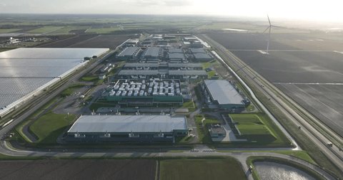 Aerial view on large scale data center in The Netherlands.: stockvideo