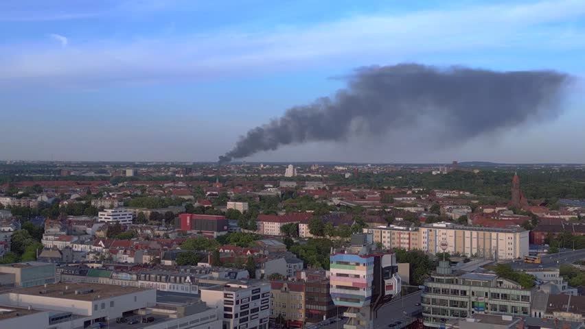 Berlin 31 May 23 Recycling yard in flames. Perfect aerial top view flight drone | Shutterstock HD Video #1104503745