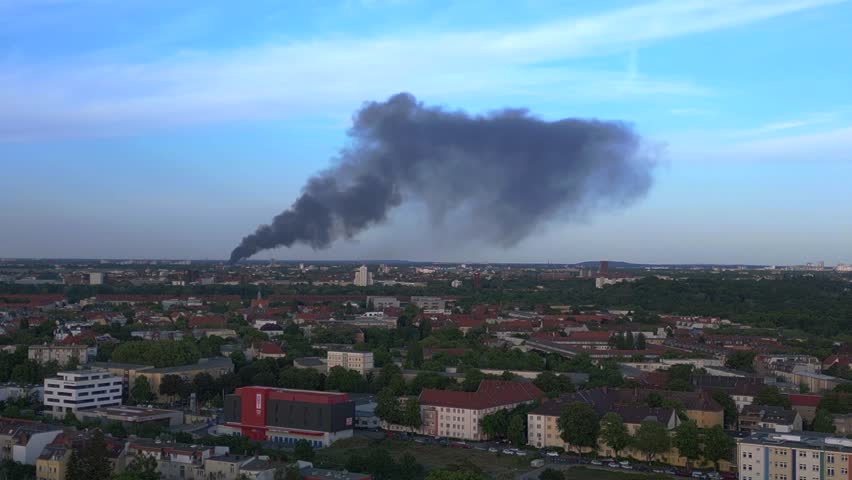 Large fire black cloud smoke. Smooth aerial top view flight drone | Shutterstock HD Video #1104503747