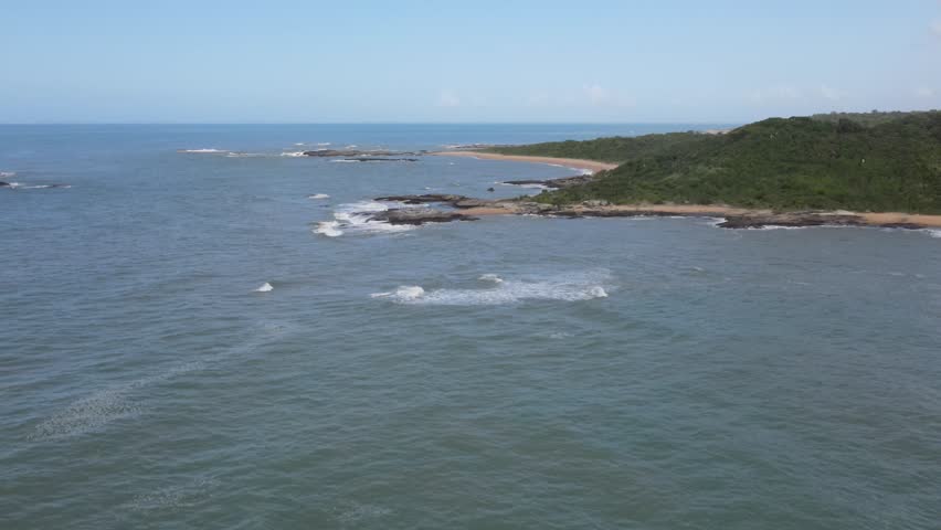 Drone-captured collection vividly showcasing Rio das Ostras' untouched beaches, bordered by majestic mountains, vibrant green farmlands, and meandering rivers, under an azure sky. Rio de Janeiro. Ocea