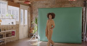 Female Fashion Model in Creative Studio Posing for Camera
