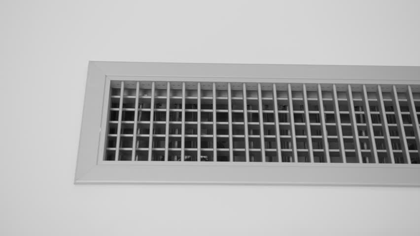 vent of an air conditioning system in the ceiling office Royalty-Free Stock Footage #1104512887