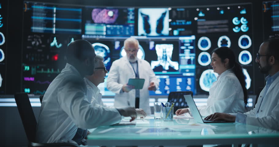 Global Pharmaceutical Research and Manufacturing Company Having a Meeting with a Group of Multiethnic Scientists, Doctors and Surgeons in a Room with Big Digital Screen with Patient Health Data Royalty-Free Stock Footage #1104516889