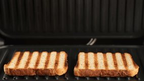 Fry toast bread on grill. Delicious Grilled Cheese Sandwich - Powered by Shutterstock - Get 15% off with code: PIKWIZARD15