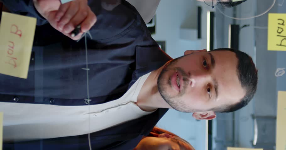 Vertical shoot. Employees are discussing company