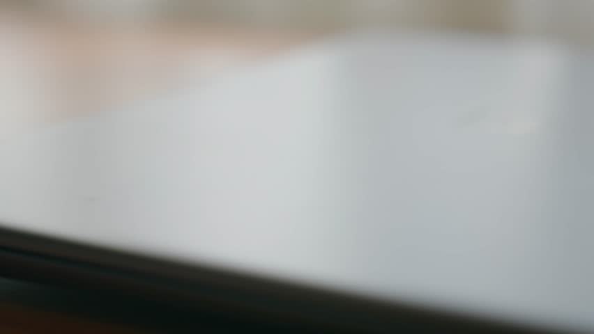 Closeup shot of a man hand typing on a keyboard. Open laptop. Starting to work.