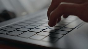 Closeup shot of a man hand typing on a keyboard. Open laptop. Starting to work. - Powered by Shutterstock - Get 15% off with code: PIKWIZARD15