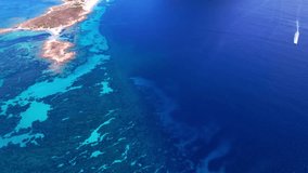 aerial drone video of splendid island and beach Tavolara in Sardegna, Italy. Sardinia island italian summer holidays
