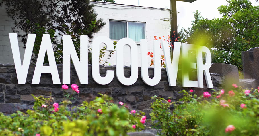 The "Vancouver" sign with big white letter put in front of a house in  Waterfront park