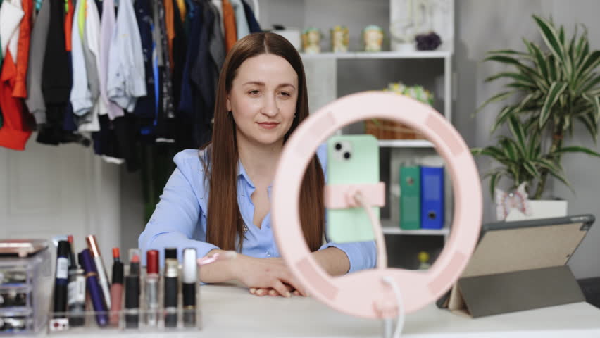 Mobile web camera view smiling young attractive caucasian woman waving hand, streaming stories online in social networks, vlogging recording selfie video, starting distant conversation