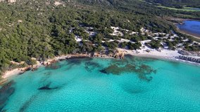 Sardegna island best beaches of Costa Smeralda, aerial drone video of Pevero beach. Italy summer holidays
