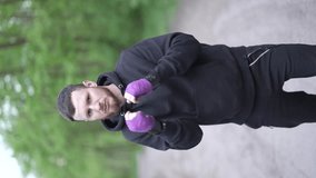 Vertical video of male boxer exercising