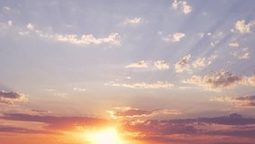 Beautiful Blue Orange Golden Sky in Sunbeams Sun and Cirrus Clouds in a Field at Sunset, Sun Setting Over Horizon Illuminating Rays and Glare Incredible Sky and Clouds Colorful Landscape 4K, Timelapse - Powered by Shutterstock - Get 15% off with code: PIKWIZARD15