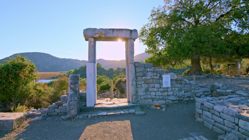Ancient city of Kaunos, Dalyan valley, Turkey. Kaunos (Latin: Caunus) was a city of ancient Caria and in Anatolia, a few km west of the modern town of Dalyan, Muğla Province, Turkey.