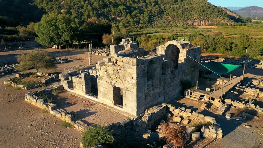 Ancient city of Kaunos, Dalyan valley, Turkey. Kaunos (Latin: Caunus) was a city of ancient Caria and in Anatolia, a few km west of the modern town of Dalyan, Muğla Province, Turkey.
