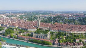 Inscription on video. Bern, Switzerland. Historic city center, general view, Aare river. Name is burning, Aerial View