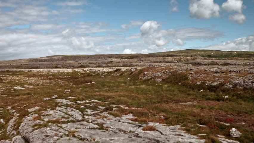Aerial shots of Ireland cliffs and rocky hills near the town of Ennis. West side of beautiful and rural Ireland.