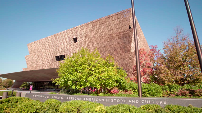 National Museum of African American History and Culture in the heart of Washington DC, USA. NMAAHC. Spectacular architectural landmark by the Smithsonian located in the National Mall. Royalty-Free Stock Footage #1104567331