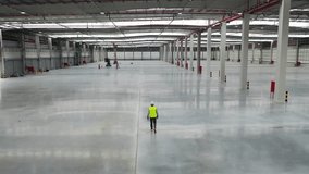 Warehouse engineer walking at new warehouse building - Powered by Shutterstock - Get 15% off with code: PIKWIZARD15