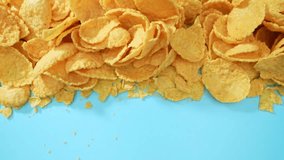 Mesmerizing macro video unveils the captivating world of corn flakes, showcasing intricate details and textures. A symphony of color and shape emerges, enchanting viewers in a mesmerizing spectacle.
