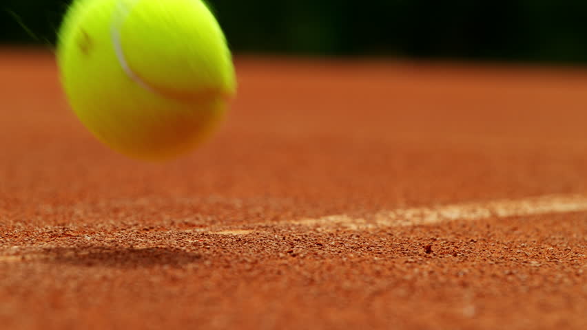 Super slow motion of Tennis ball ping on clay court inside or outside white line. Filmed on high speed cinematic camera at 1000 fps. | Shutterstock HD Video #1104585497